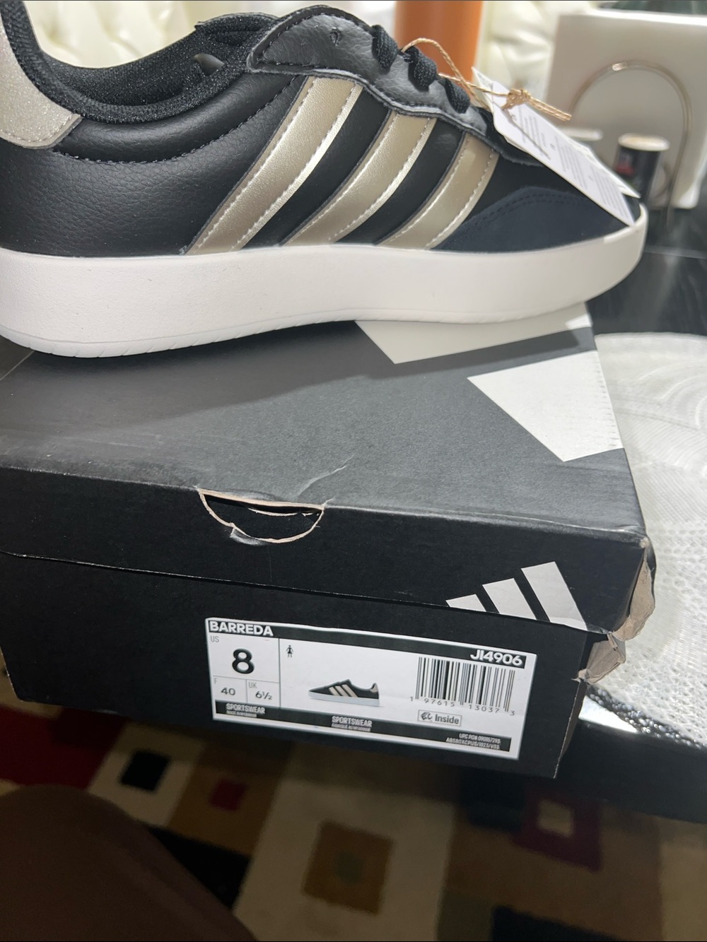 adidas Black Sneakers with Gold Stripes